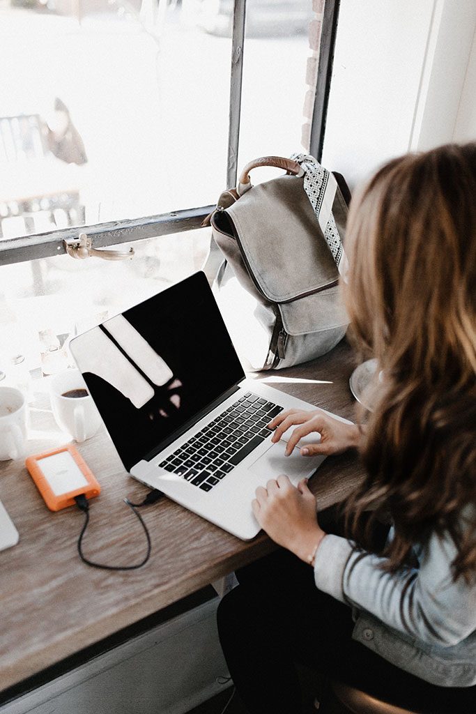 working remotely girl at desk