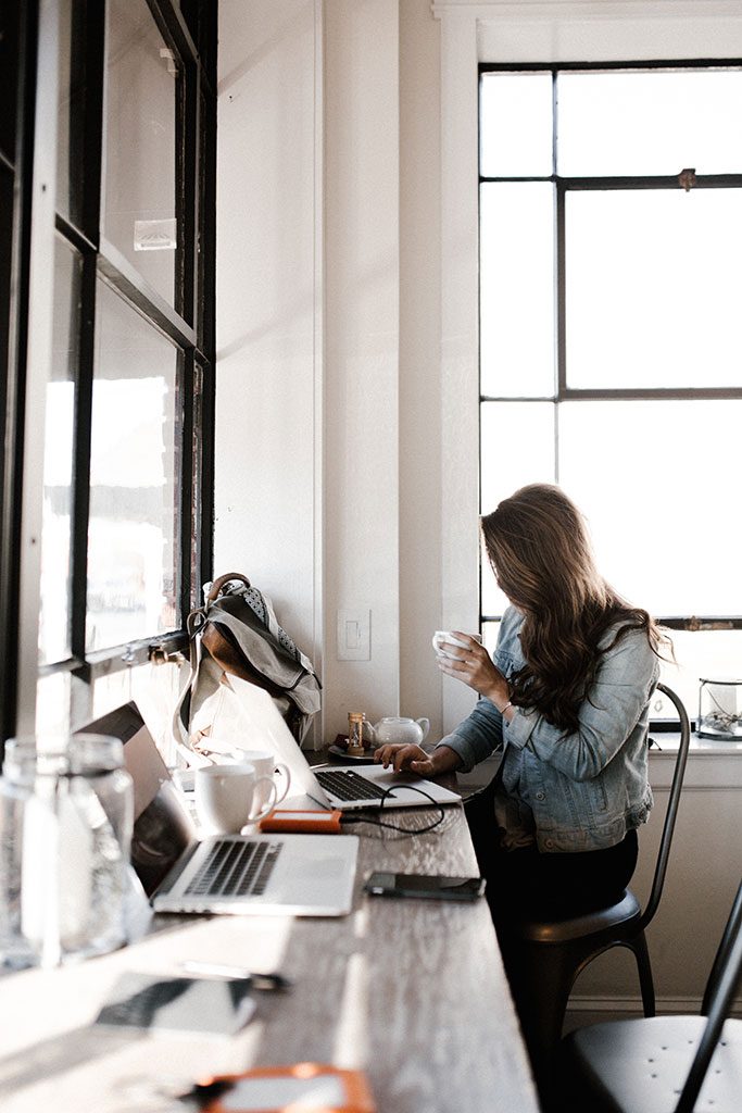 working remotely girl at desk